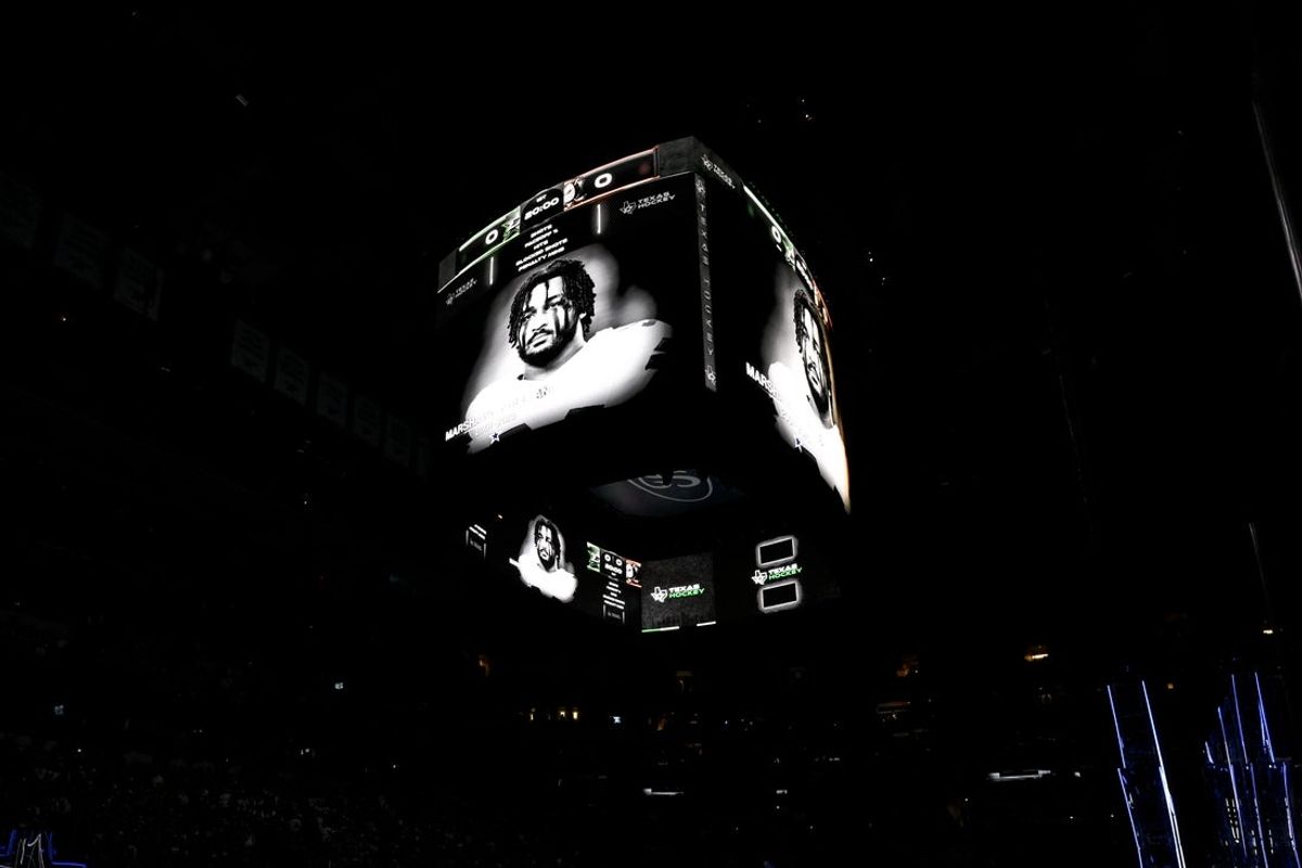 Nov 6, 2025; Dallas, Texas, USA; The Dallas Stars and Anaheim Ducks observe a moment of silence to honor the memory of Dallas Cowboys defensive end Marshawn Kneeland before their game at the American Airlines Center. Mandatory Credit: Jerome Miron-Imagn Images