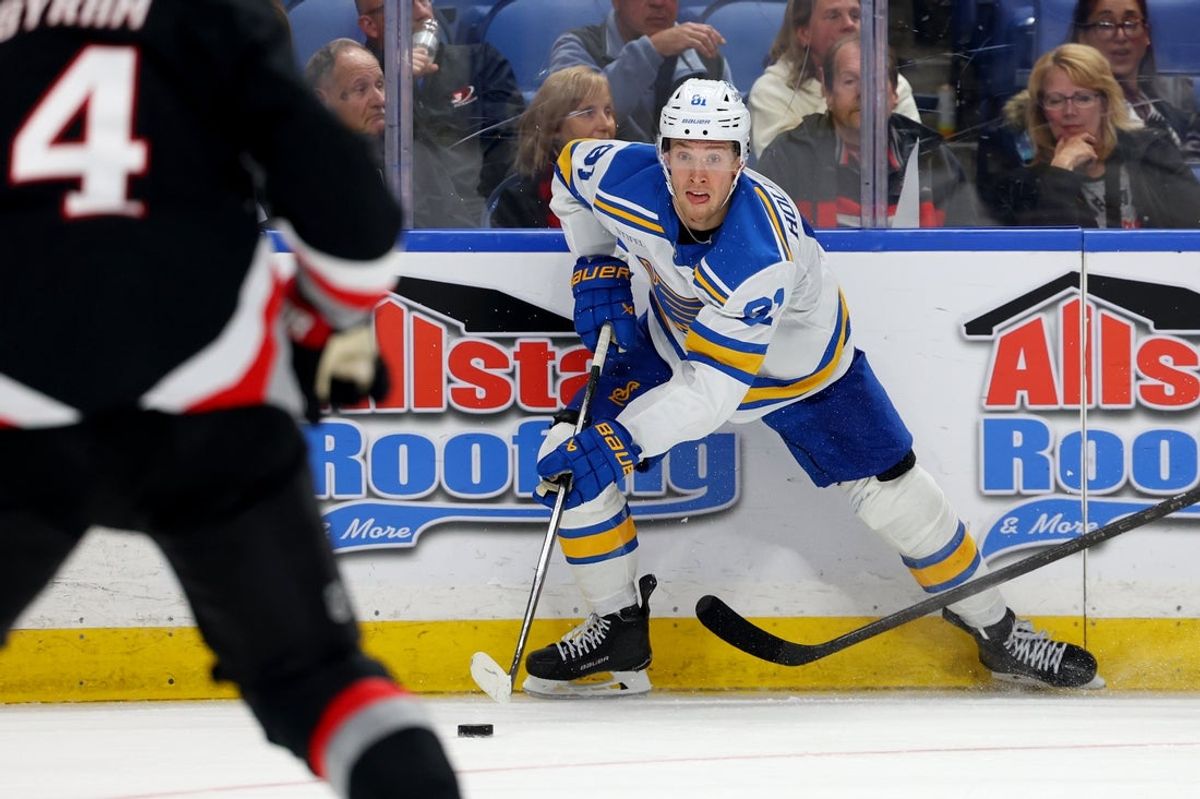 Nov 6, 2025; Buffalo, New York, USA;  St. Louis Blues left wing Dylan Holloway (81) looks to make a pass during the third period against the Buffalo Sabres at KeyBank Center. Mandatory Credit: Timothy T. Ludwig-Imagn Images
