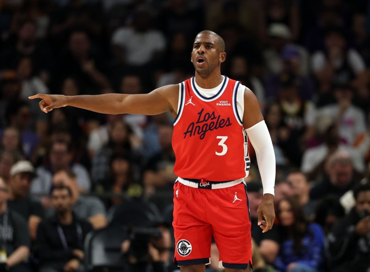 Nov 6, 2025; Phoenix, Arizona, USA; Los Angeles Clippers guard Chris Paul (3) against the Phoenix Suns in the first half at the Mortgage Matchup Center. Mandatory Credit: Mark J. Rebilas-Imagn Images