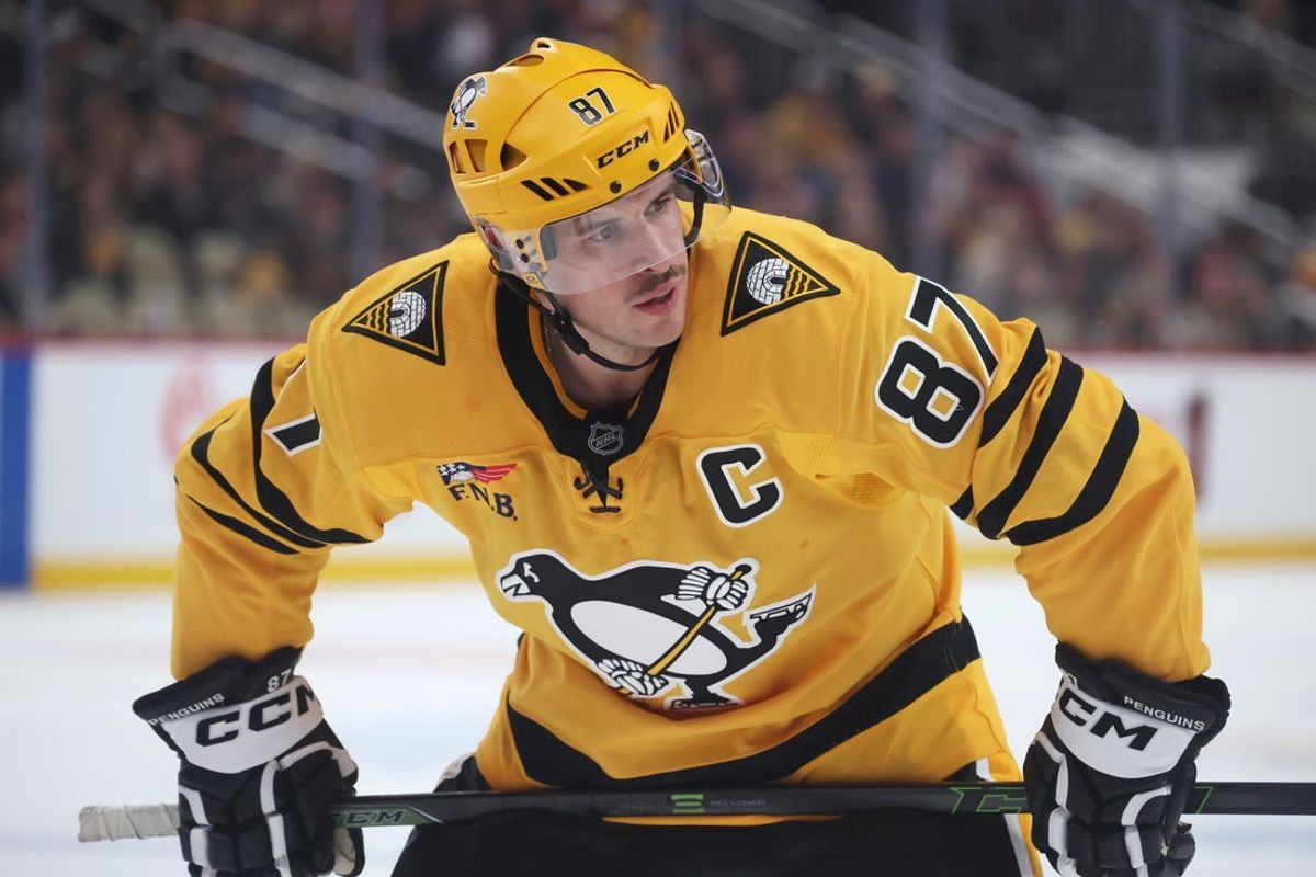 Nov 6, 2025; Pittsburgh, Pennsylvania, USA;  Pittsburgh Penguins center Sidney Crosby (87) looks on at the face-off circle against the Washington Capitals during the third period at PPG Paints Arena. Mandatory Credit: Charles LeClaire-Imagn Images
