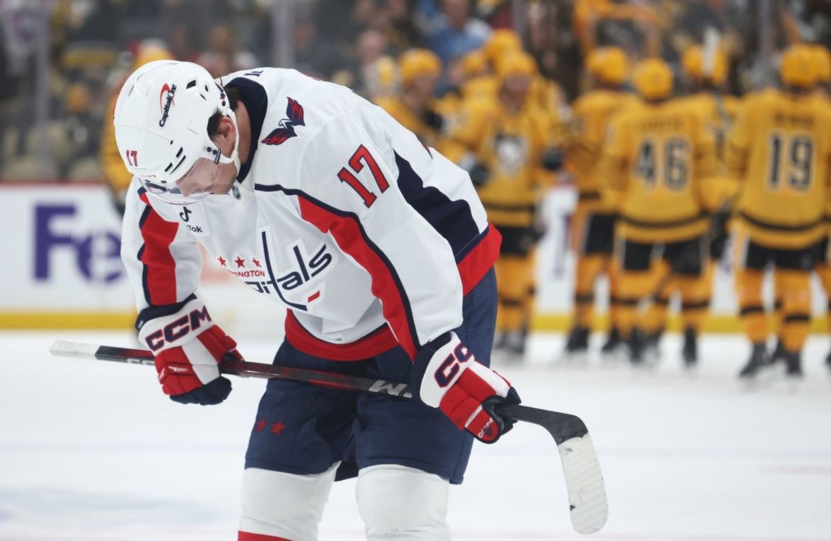 Nov 6, 2025; Pittsburgh, Pennsylvania, USA;  Washington Capitals center Dylan Strome (17) reacts as the Pittsburgh Penguins celebrate a victory at PPG Paints Arena. Mandatory Credit: Charles LeClaire-Imagn Images