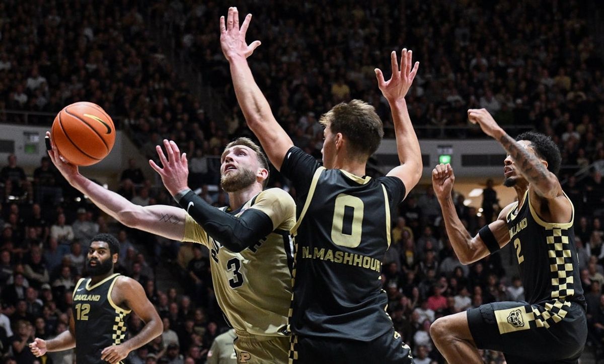 Nov 7, 2025; West Lafayette, Indiana, USA; Purdue Boilermakers guard Braden Smith (3) shoots the ball against Oakland Golden Grizzlies guard Nassim Mashhour (0) during the second half at Mackey Arena. Mandatory Credit: Marc Lebryk-Imagn Images