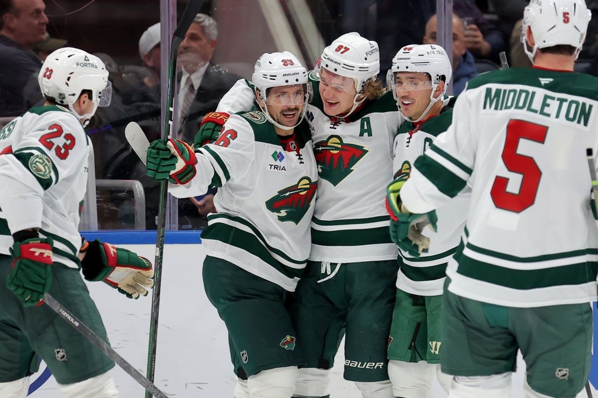 Nov 7, 2025; Elmont, New York, USA; Minnesota Wild right wing Mats Zuccarello (36) celebrates a goal against the New York Islanders with center Marco Rossi (23) and left wing Kirill Kaprizov (97) and defensemen Jared Spurgeon (46) and Jake Middleton (5) during the third period at UBS Arena. Mandatory Credit: Brad Penner-Imagn Images