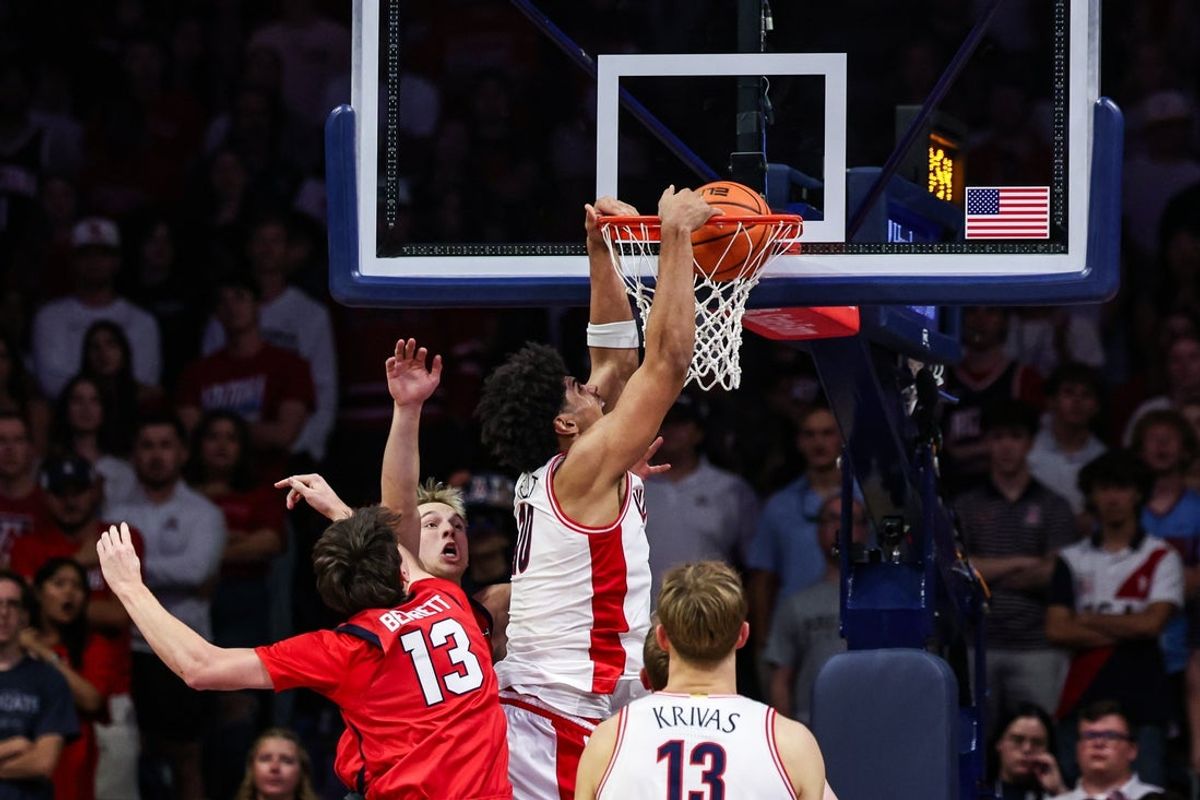 Nov 7, 2025; Tucson, Arizona, USA; Arizona Wildcats forward Koa Peat (10) dunks the ball during the first half of the game against the Utah Tech Trailblazers at McKale Memorial Center. Mandatory Credit: Aryanna Frank-Imagn Images