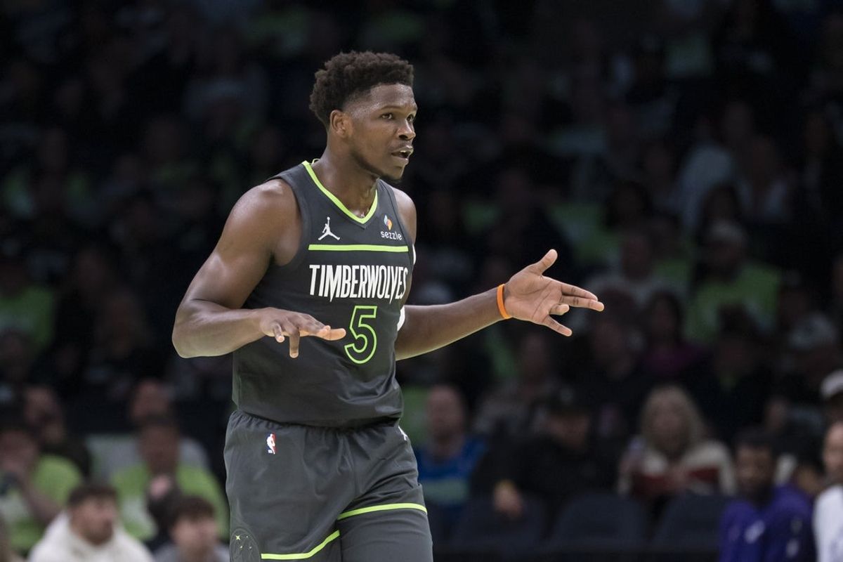 Nov 7, 2025; Minneapolis, Minnesota, USA; Minnesota Timberwolves guard Anthony Edwards (5) celebrates making a three-point shot against the Utah Jazz in the second half at Target Center. Mandatory Credit: Jesse Johnson-Imagn Images