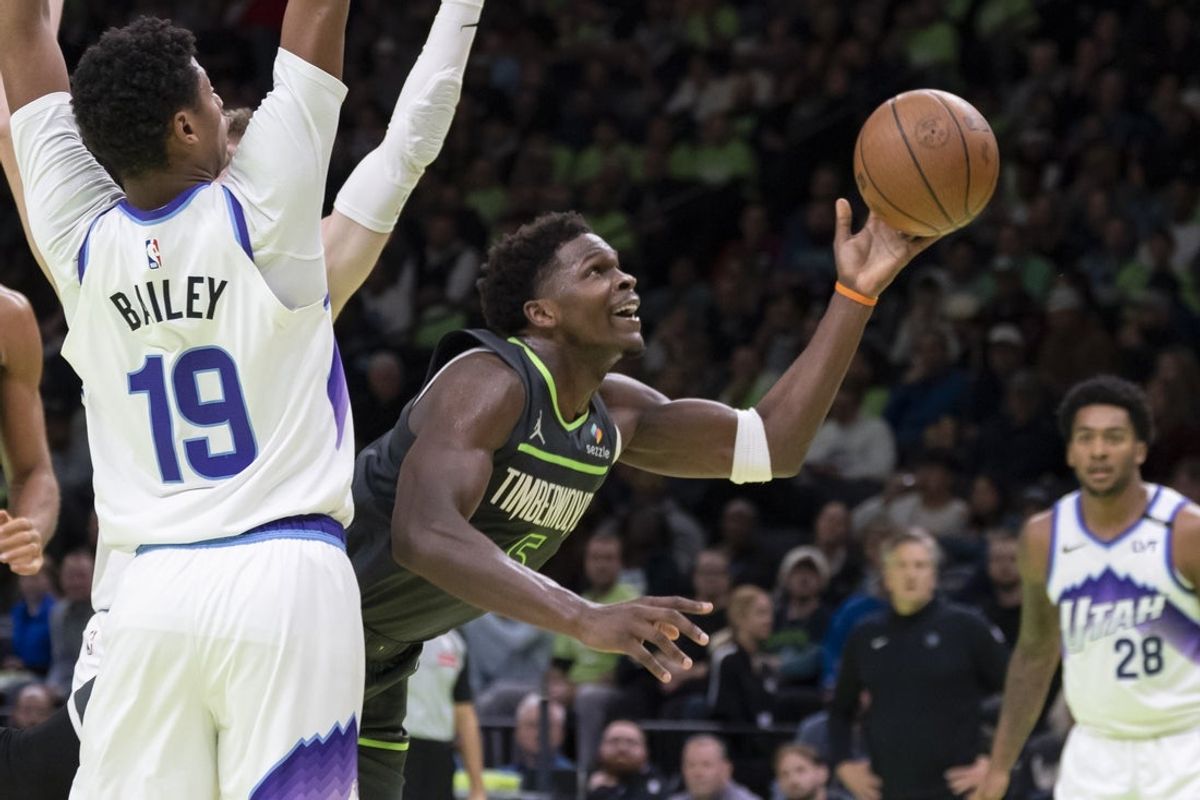 Nov 7, 2025; Minneapolis, Minnesota, USA; Minnesota Timberwolves guard Anthony Edwards (5) drives to the basket against the Utah Jazz in the second half at Target Center. Mandatory Credit: Jesse Johnson-Imagn Images