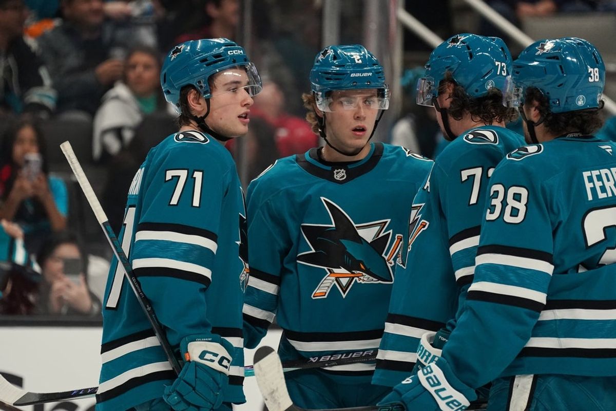 Nov 7, 2025; San Jose, California, USA;  San Jose Sharks centers Macklin Celebrini (71), Will Smith (2) and Tyler Toffoli (73) chat during during a timeout against the Winnipeg Jets during the second period at SAP Center at San Jose. Mandatory Credit: David Gonzales-Imagn Images