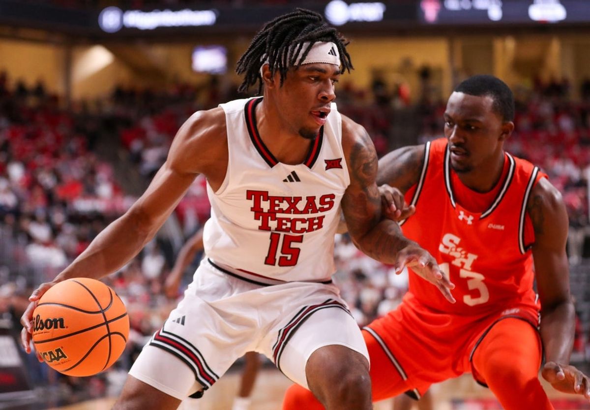 Texas Tech's JT Toppin handles the ball against Sam Houston during a nonconference men's basketball game, Friday, Nov. 7, 2025, at United Supermarkets Arena.