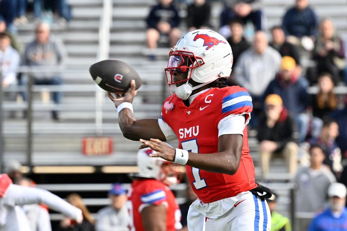 Nov 8, 2025; Chestnut Hill, Massachusetts, USA; SMU Mustangs quarterback Kevin Jennings (7) throws a pass during the first half against the Boston College Eagles at Alumni Stadium. Mandatory Credit: Eric Canha-Imagn Images