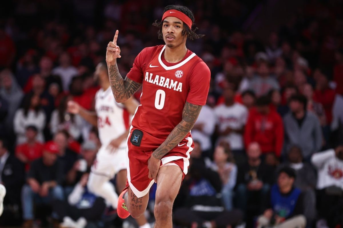 Nov 8, 2025; New York, New York, USA; Alabama Crimson Tide guard Labaron Philon (0) celebrates after making a three point shot in the second half against the St. John's Red Storm at Madison Square Garden. Mandatory Credit: Wendell Cruz-Imagn Images