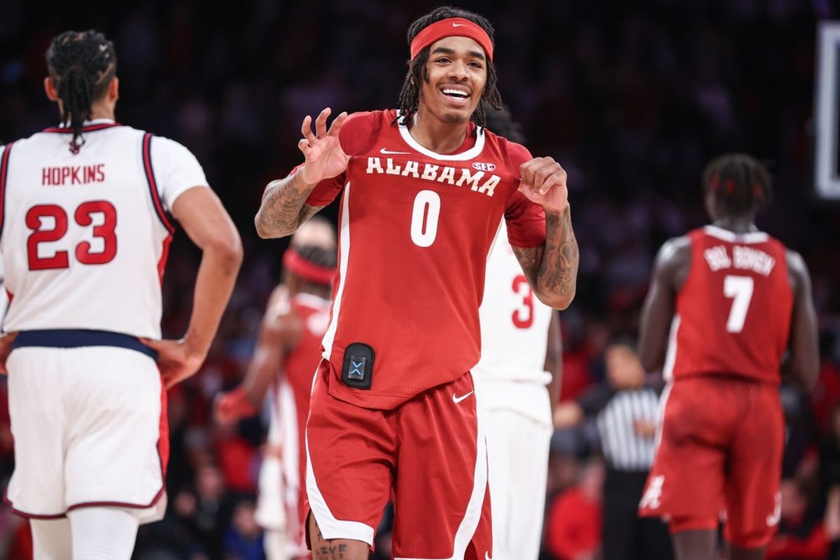 Nov 8, 2025; New York, New York, USA; Alabama Crimson Tide guard Labaron Philon (0) celebrates in the second half against the St. John's Red Storm at Madison Square Garden. Mandatory Credit: Wendell Cruz-Imagn Images