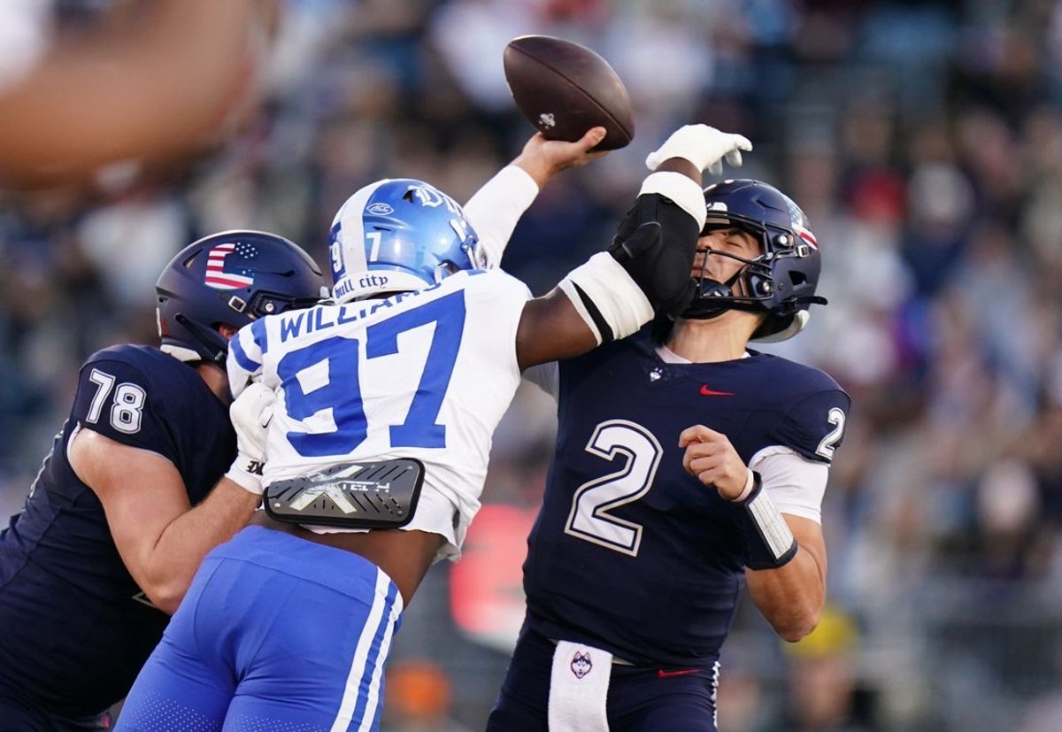 Nov 8, 2025; East Hartford, Connecticut, USA; UConn Huskies quarterback Joe Fagnano (2) throws a pass against the Duke Blue Devils in the first quarter at Pratt & Whitney Stadium at Rentschler Field. Mandatory Credit: David Butler II-Imagn Images