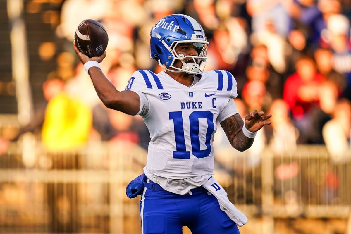 Nov 8, 2025; East Hartford, Connecticut, USA; Duke Blue Devils quarterback Darian Mensah (10) throws a pass against the UConn Huskies in the first quarter at Pratt & Whitney Stadium at Rentschler Field. Mandatory Credit: David Butler II-Imagn Images