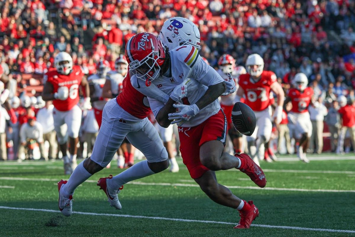 Nov 8, 2025; Piscataway, New Jersey, USA; Rutgers Scarlet Knights defensive back Bo Mascoe (3) forces a fumble by Maryland Terrapins wide receiver Jalil Farooq (1) during the first half at SHI Stadium. Mandatory Credit: Vincent Carchietta-Imagn Images