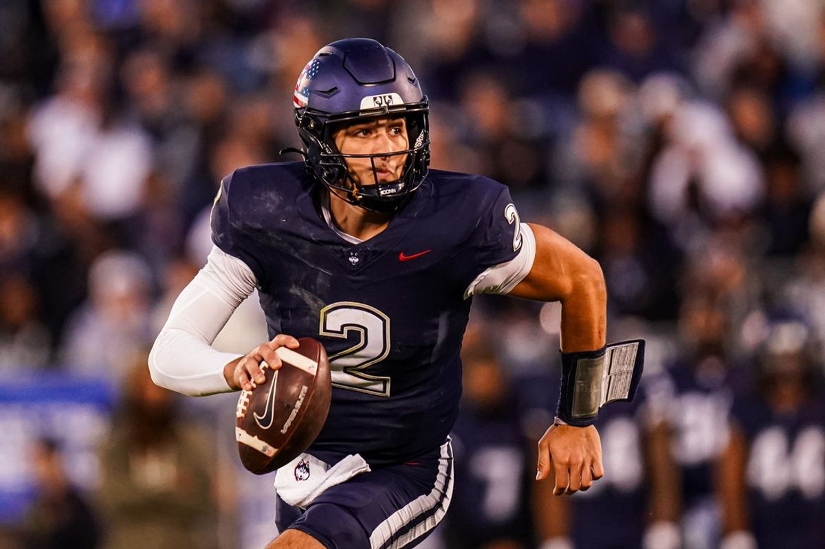 Nov 8, 2025; East Hartford, Connecticut, USA; UConn Huskies quarterback Joe Fagnano (2) runs the ball against the Duke Blue Devils in the second quarter at Pratt & Whitney Stadium at Rentschler Field. Mandatory Credit: David Butler II-Imagn Images