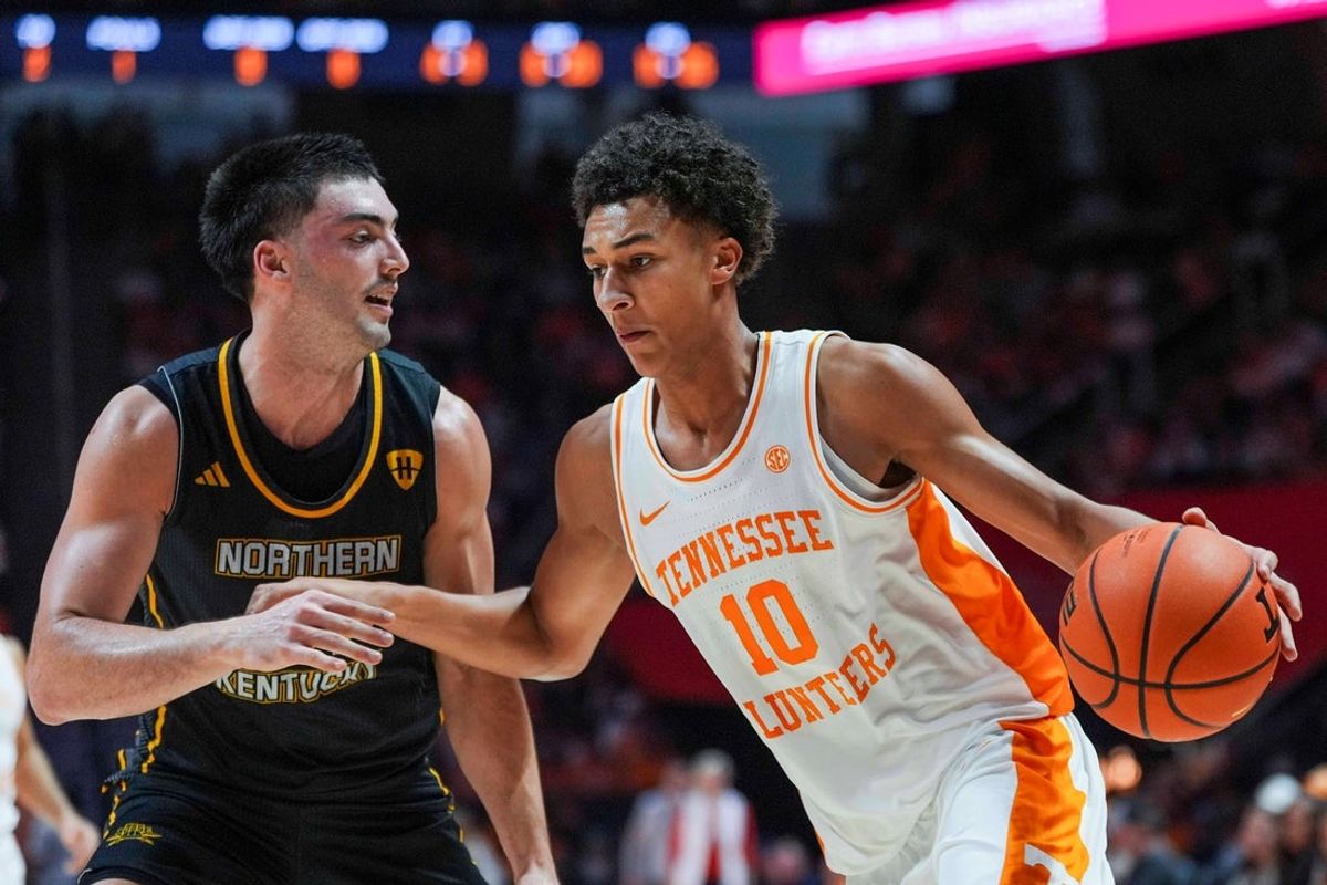Tennessee forward Nate Ament (10) dribbles around Northern Kentucky forward Kael Robinson (24) during a NCAA basketball game between the Tennessee Volunteers and Northern Kentucky Norse at Thompson-Boling Arena at Food City Center on Nov. 8, 2025.