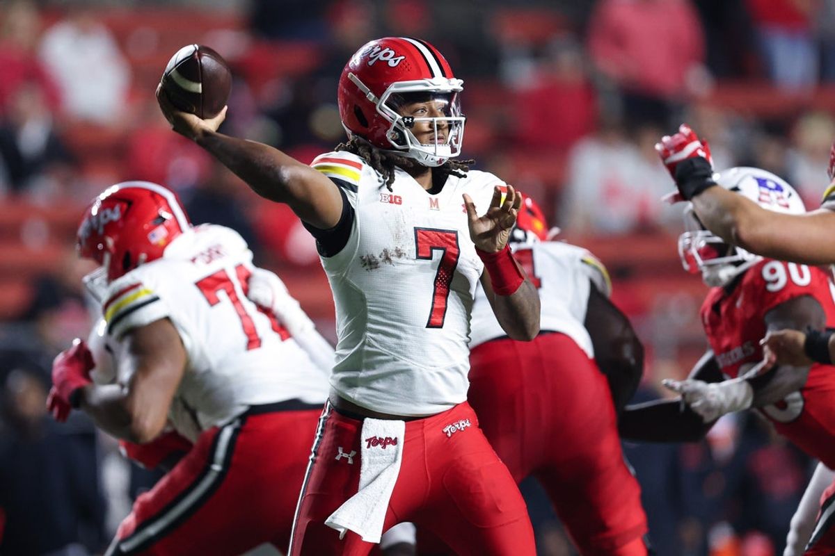 Nov 8, 2025; Piscataway, New Jersey, USA; Maryland Terrapins quarterback Malik Washington (7) throws the ball during the second half against the Rutgers Scarlet Knights at SHI Stadium. Mandatory Credit: Vincent Carchietta-Imagn Images