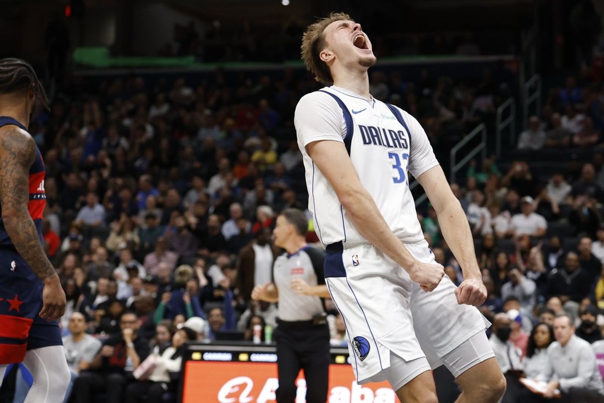 Nov 8, 2025; Washington, District of Columbia, USA; Dallas Mavericks forward Cooper Flagg (32) reacts after a dunk against the Washington Wizards in the first half at Capital One Arena. Mandatory Credit: Geoff Burke-Imagn Images