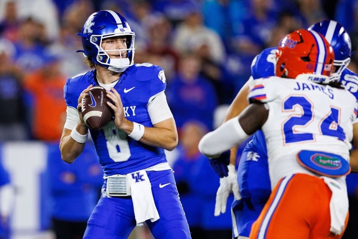 Nov 8, 2025; Lexington, Kentucky, USA; Kentucky Wildcats quarterback Cutter Boley (8) looks for a receiver during the first quarter against the Florida Gators at Kroger Field. Mandatory Credit: Jordan Prather-Imagn Images