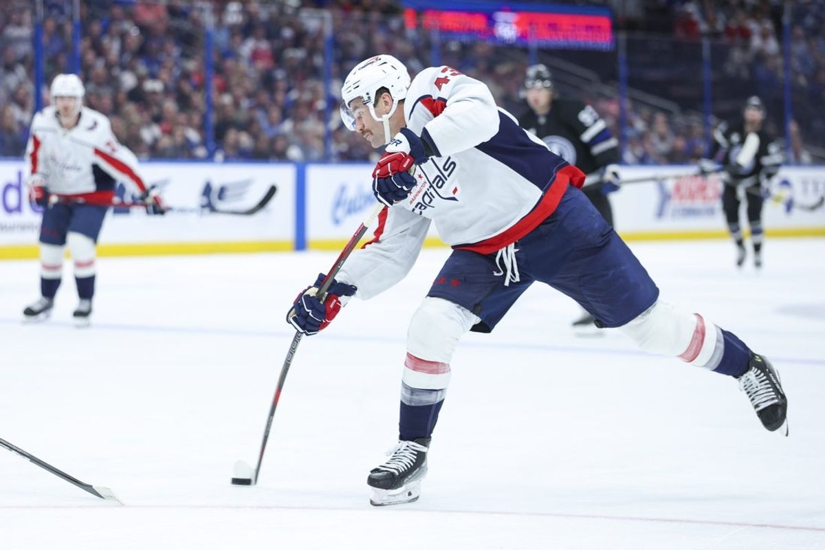 Nov 8, 2025; Tampa, Florida, USA; Washington Capitals right wing Tom Wilson (43) shoots the puck against the Tampa Bay Lightning in the second period at Benchmark International Arena. Mandatory Credit: Nathan Ray Seebeck-Imagn Images
