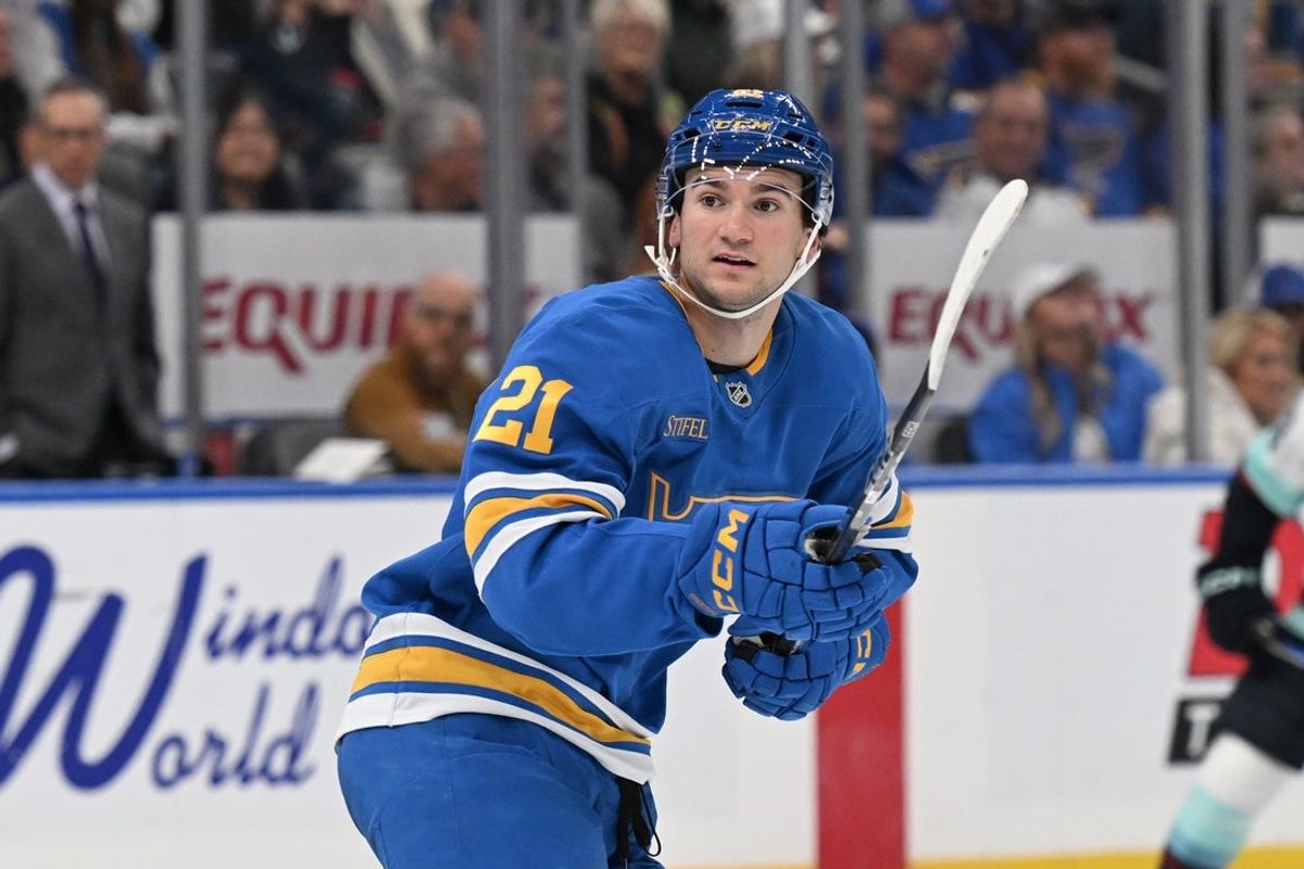 Nov 8, 2025; St. Louis, Missouri, USA; St. Louis Blues right wing Jimmy Snuggerud (21) looks on during a game against the Seattle Kraken in the third period at Enterprise Center. Mandatory Credit: Joe Puetz-Imagn Images