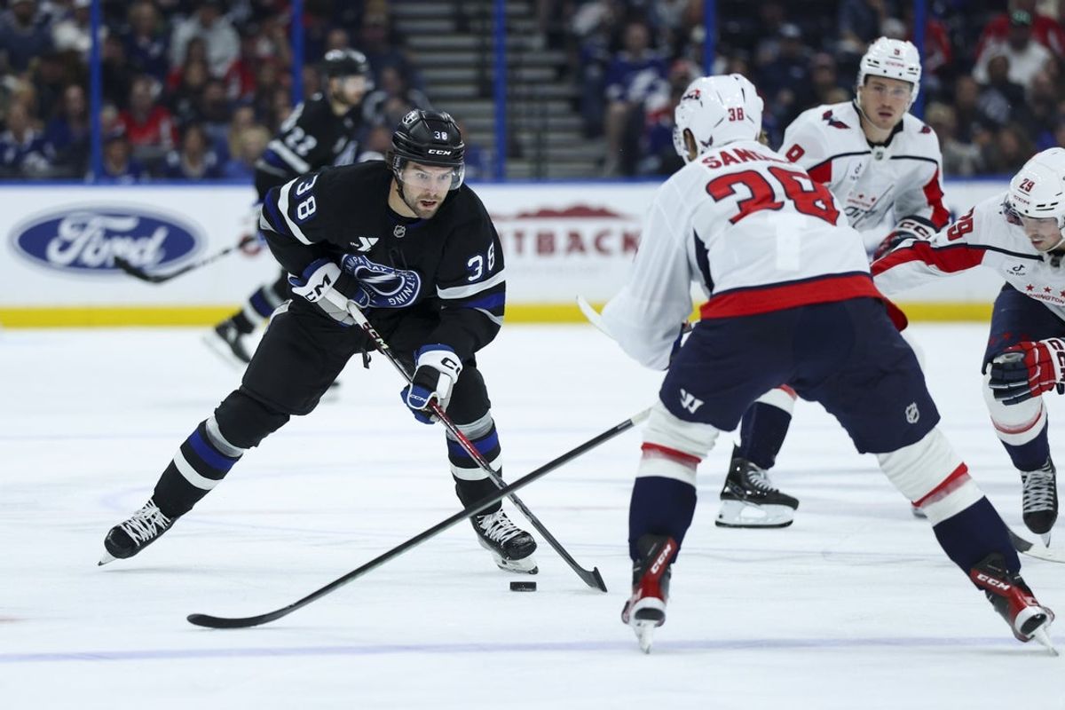 Nov 8, 2025; Tampa, Florida, USA; Tampa Bay Lightning left wing Brandon Hagel (38) controls the puck against the Washington Capitals in the third period at Benchmark International Arena. Mandatory Credit: Nathan Ray Seebeck-Imagn Images
