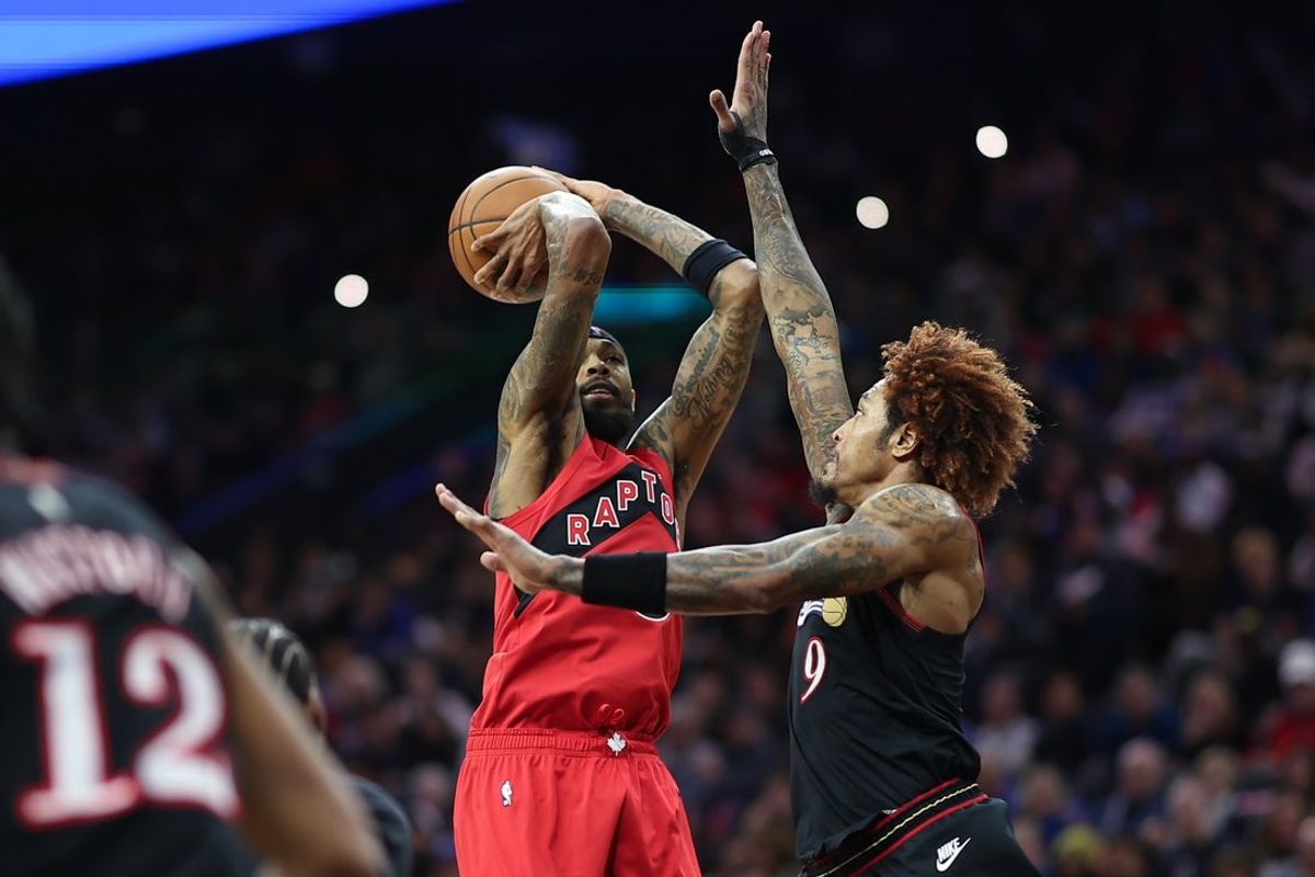 Nov 8, 2025; Philadelphia, Pennsylvania, USA; Toronto Raptors forward Brandon Ingram (3) shoots in front of Philadelphia 76ers guard Kelly Oubre Jr. (9) during the third quarter at Xfinity Mobile Arena. Mandatory Credit: Bill Streicher-Imagn Images