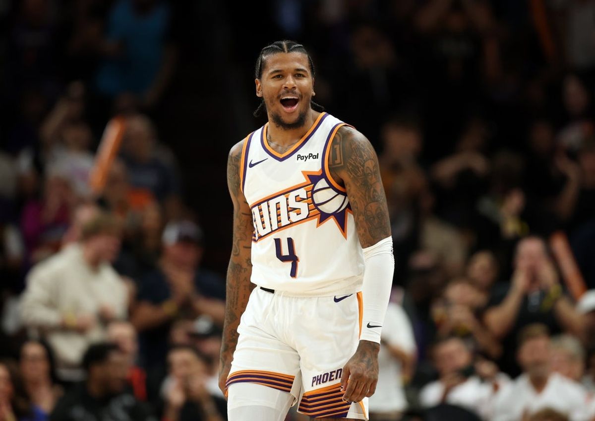 Nov 6, 2025; Phoenix, Arizona, USA; Phoenix Suns guard Jalen Green (4) celebrates against the Los Angeles Clippers at the Mortgage Matchup Center. Mandatory Credit: Mark J. Rebilas-Imagn Images