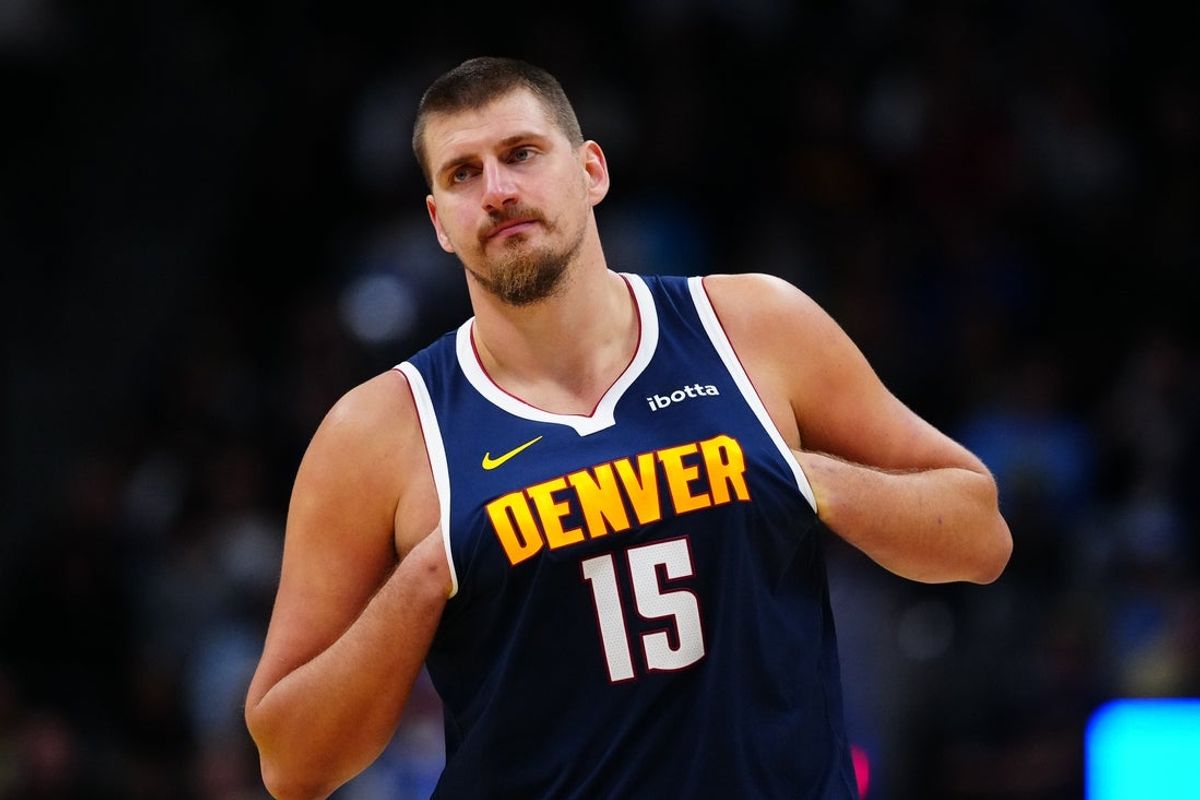 Nov 8, 2025; Denver, Colorado, USA; Denver Nuggets center Nikola Jokic (15) during the second half against the Indiana Pacers at Ball Arena. Mandatory Credit: Ron Chenoy-Imagn Images