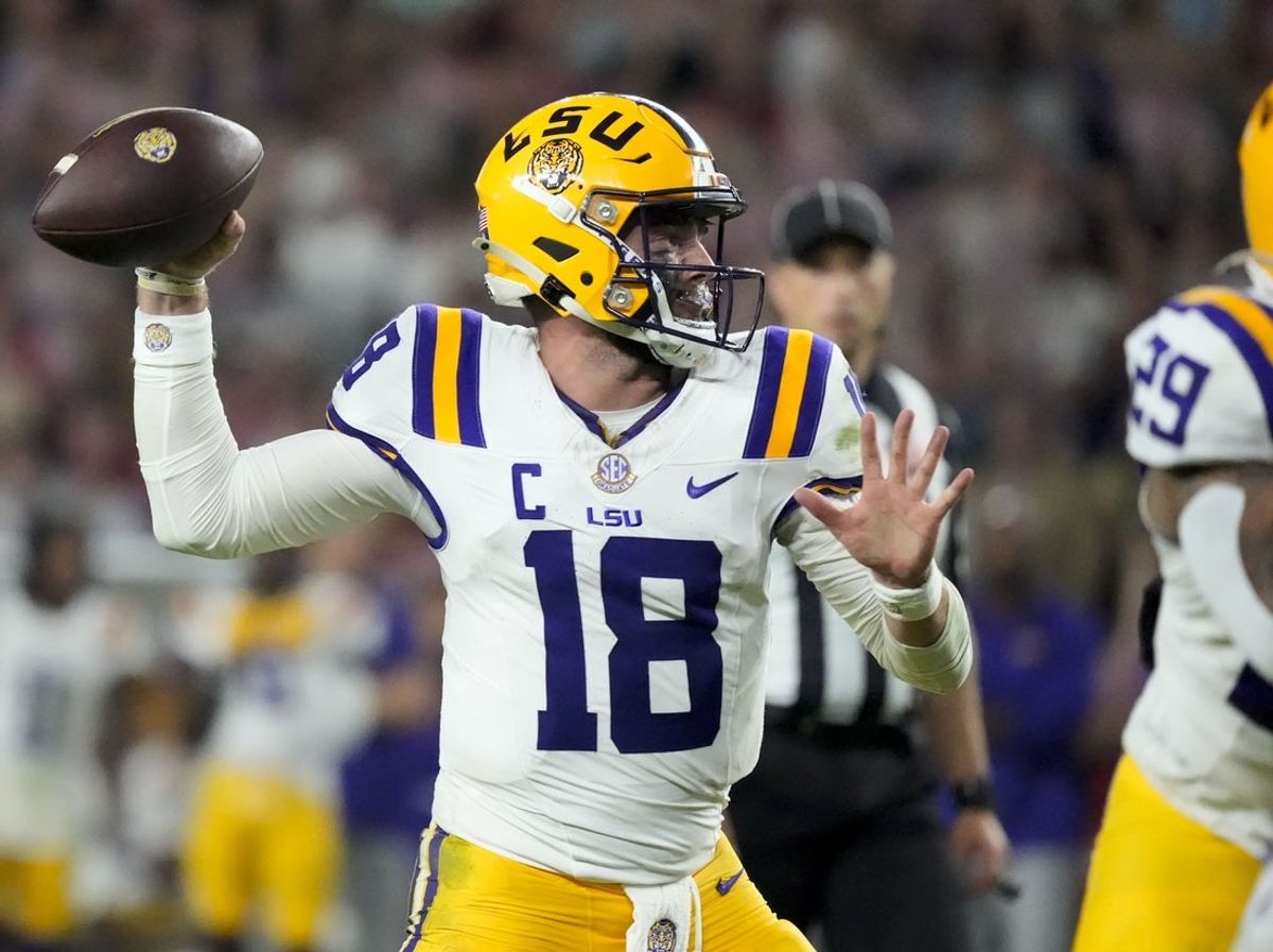 Nov 8, 2025; Tuscaloosa, Alabama, USA;  LSU quarterback Garrett Nussmeier (18) throws a pass during the second half of the game with Alabama at Saban Field at Bryant-Denny Stadium. Alabama defeated LSU 20-9. Mandatory Credit: Gary Cosby Jr.-Imagn Images