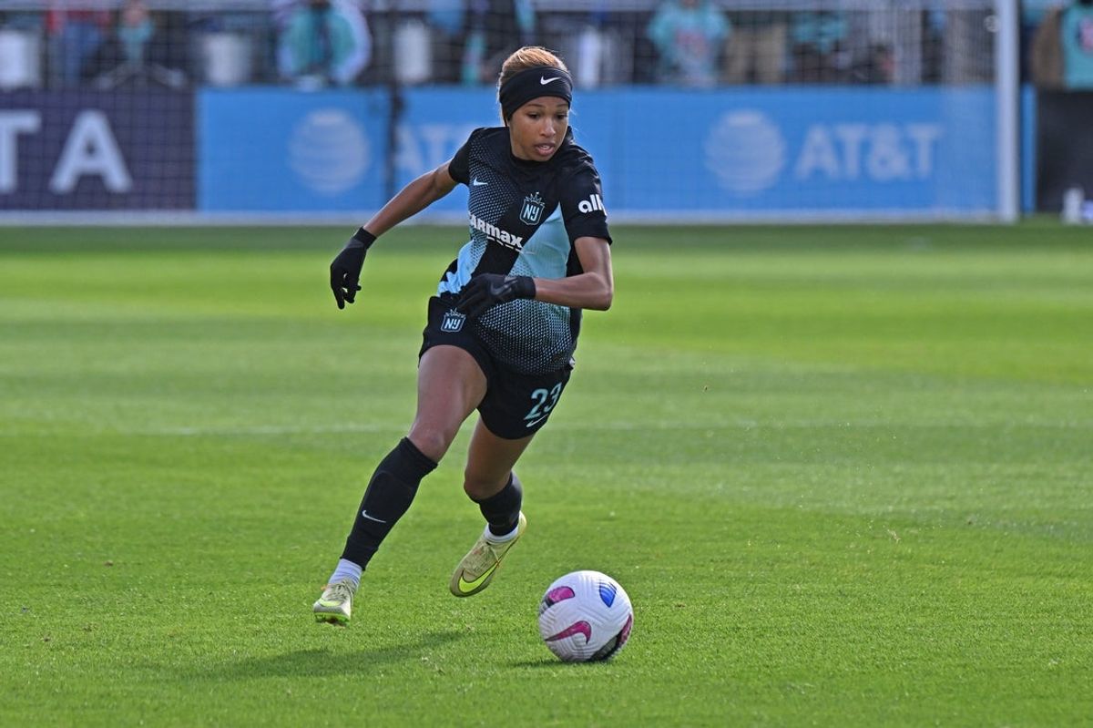 Nov 9, 2025; Kansas City, Missouri, USA;  NJ/NY Gotham FC forward Midge Purce (23) dribbles the ball up field against the Kansas City Current in the first half at CPKC Stadium. Mandatory Credit: Peter Aiken-Imagn Images