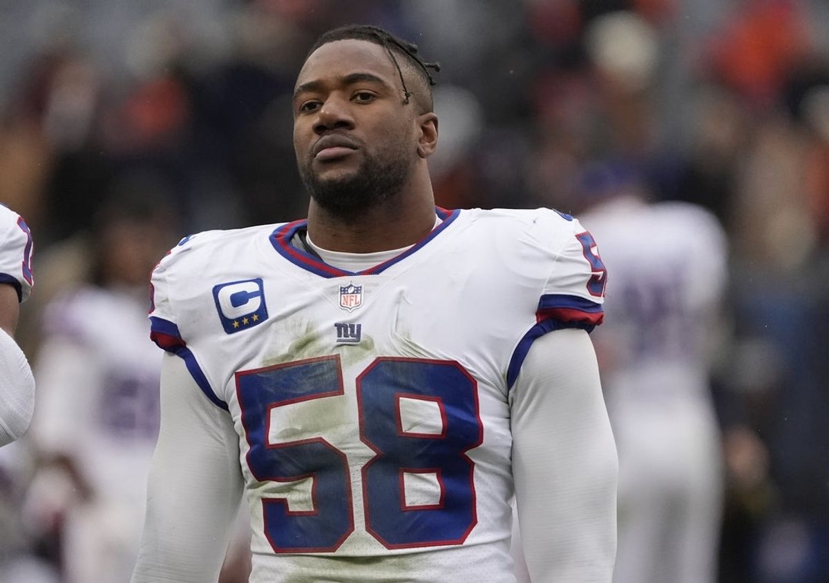 Nov 9, 2025; Chicago, Illinois, USA; New York Giants linebacker Bobby Okereke (58) leaves the field after losing to the Chicago Bears at Soldier Field. Mandatory Credit: David Banks-Imagn Images