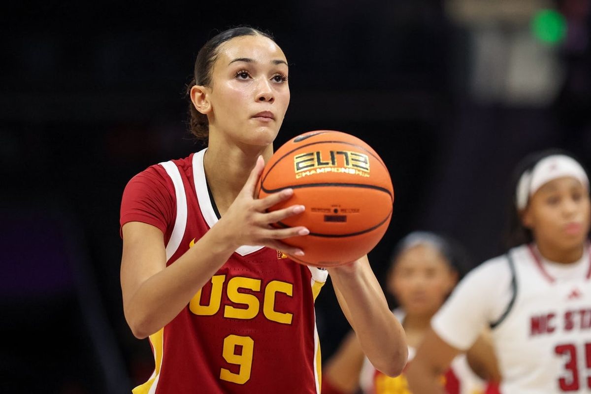 Nov 9, 2025; Charlotte, North Carolina, USA; Southern California Trojans guard Jazzy Davidson (9) makes a free throw against the NC State Wolfpack during the third quarter of the Ally Tipoff game at Spectrum Center. Mandatory Credit: Cory Knowlton-Imagn Images