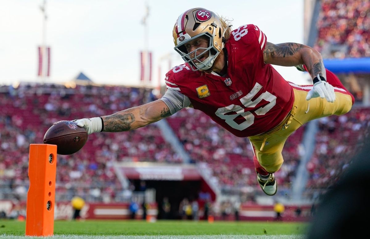 Nov 9, 2025; Santa Clara, California, USA; San Francisco 49ers tight end George Kittle (85) scores a touchdown during the fourth quarter against the Los Angeles Rams at Levi's Stadium. Mandatory Credit: Kyle Terada-Imagn Images