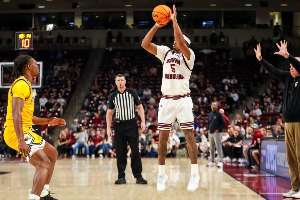 Nov 9, 2025; Columbia, South Carolina, USA; South Carolina Gamecocks guard Meechie Johnson (5) attempts a three point basket against the Southern Mississippi Golden Eagles in the first half at Colonial Life Arena. Mandatory Credit: Jeff Blake-Imagn Images