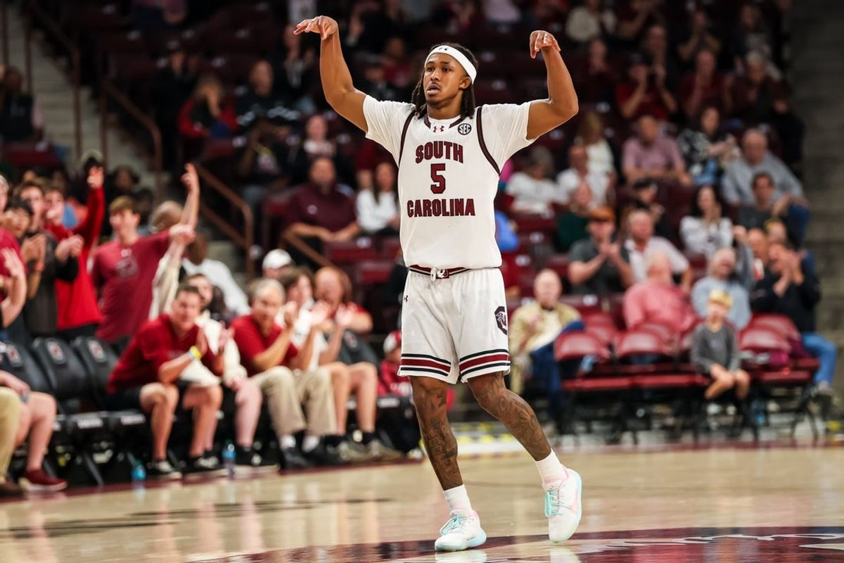 Nov 9, 2025; Columbia, South Carolina, USA; South Carolina Gamecocks guard Meechie Johnson (5) celebrates a three point basket against the Southern Mississippi Golden Eagles in the first half at Colonial Life Arena. Mandatory Credit: Jeff Blake-Imagn Images