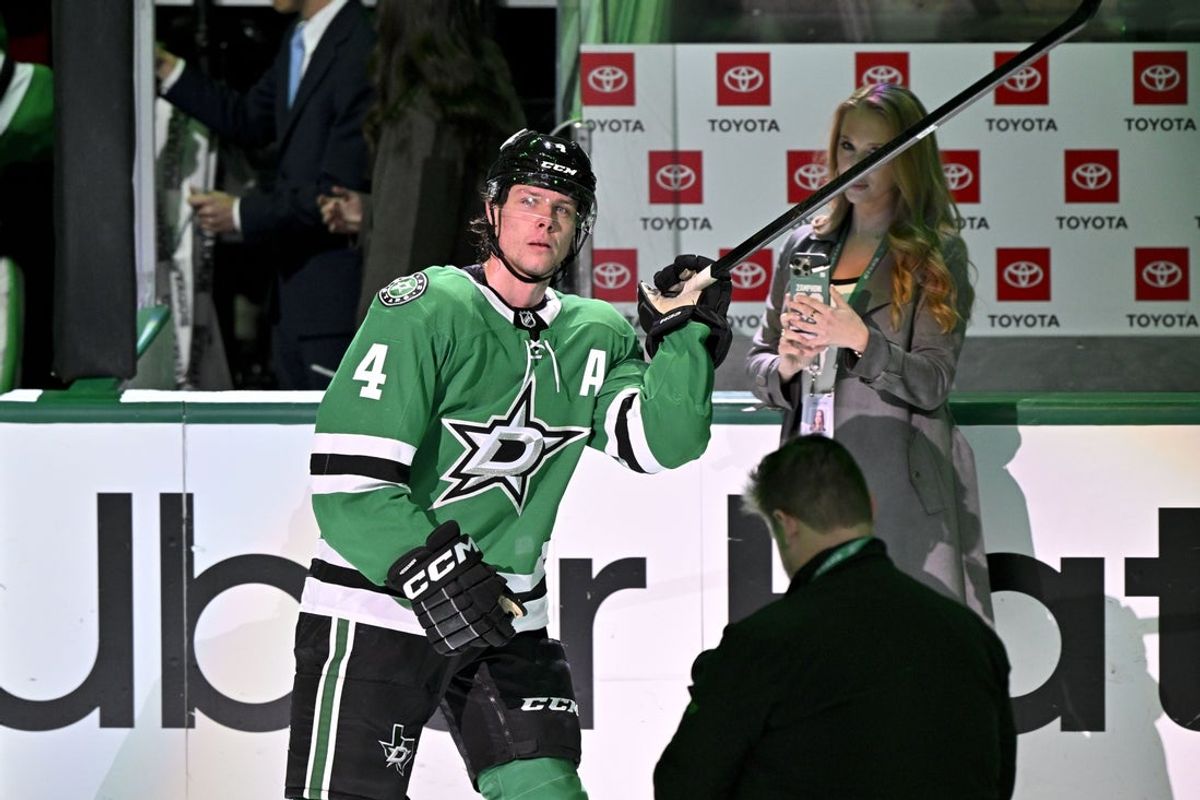Nov 9, 2025; Dallas, Texas, USA; Dallas Stars defenseman Miro Heiskanen (4) waves to the fans after being named the number three star in the win over the Seattle Kraken at the American Airlines Center. Mandatory Credit: Jerome Miron-Imagn Images