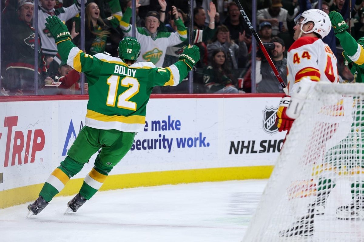 Nov 9, 2025; Saint Paul, Minnesota, USA; Minnesota Wild left wing Matt Boldy (12) celebrates his goal against the Calgary Flames during the second period at Grand Casino Arena. Mandatory Credit: Matt Krohn-Imagn Images