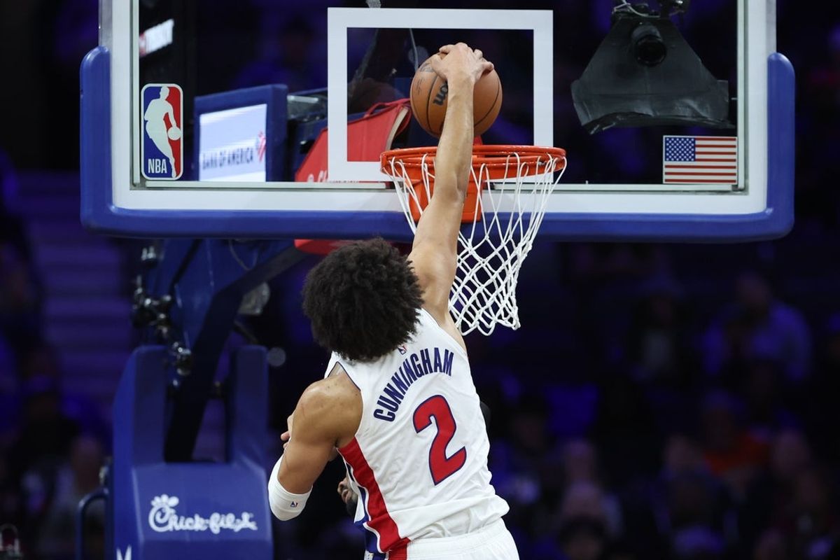 Nov 9, 2025; Philadelphia, Pennsylvania, USA; Detroit Pistons guard Cade Cunningham (2) dunks the ball against the Philadelphia 76ers during the fourth quarter at Xfinity Mobile Arena. Mandatory Credit: Bill Streicher-Imagn Images