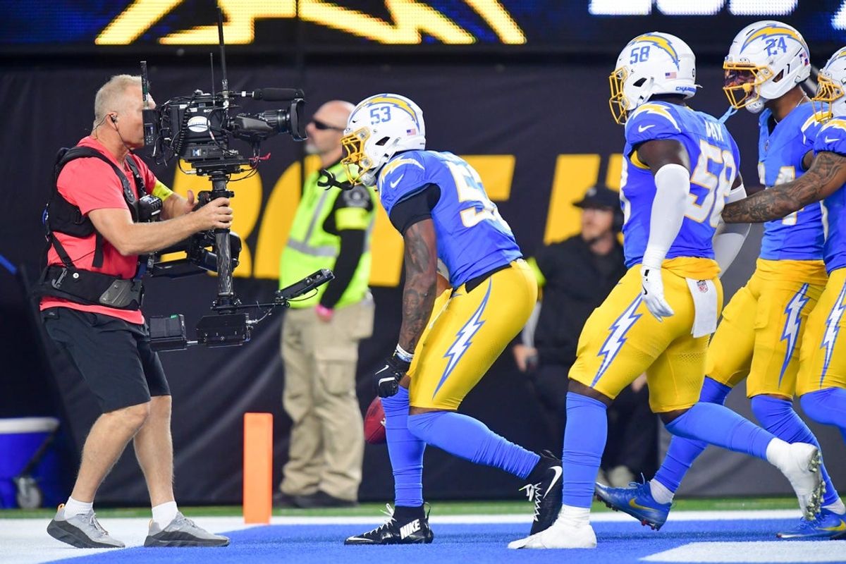 Nov 9, 2025; Inglewood, California, USA; Los Angeles Chargers linebacker Del'Shawn Phillips (53) celebrates after a muffed punt recovery against the Pittsburgh Steelers during the fourth quarter of the game at SoFi Stadium. Mandatory Credit: Gary A. Vasquez-Imagn Images