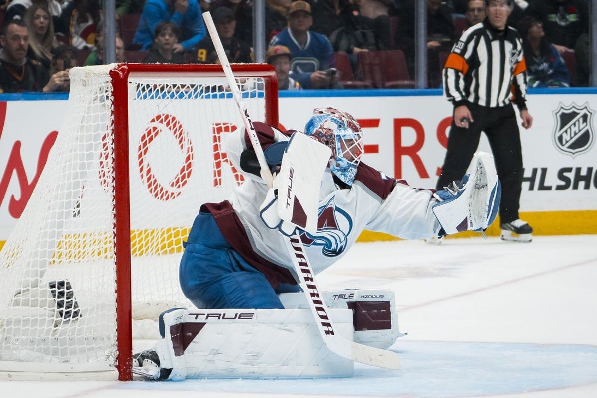 Nov 9, 2025; Vancouver, British Columbia, CAN; Colorado Avalanche goalie Mackenzie Blackwood (39) makes a save against the Vancouver Canucks in the second period at Rogers Arena. Mandatory Credit: Bob Frid-Imagn Images