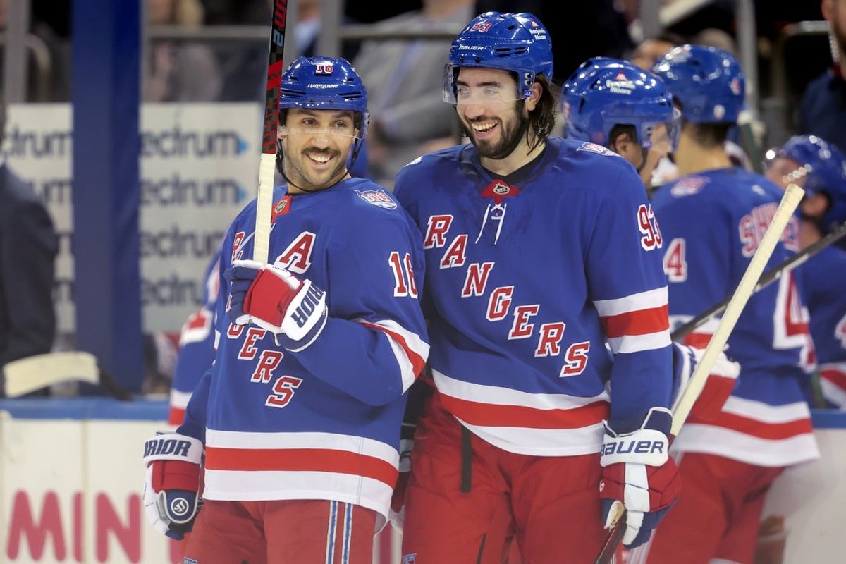 Nov 10, 2025; New York, New York, USA; New York Rangers center Vincent Trocheck (16) laughs with center Mika Zibanejad (93) during the second period against the Nashville Predators at Madison Square Garden. Mandatory Credit: Brad Penner-Imagn Images