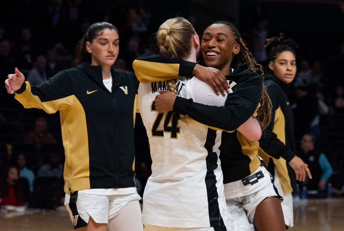Vanderbilt Commodores guard Aga Makurat (24) embraces her teammates after Vanderbilt's win against Furman at the Memorial Gymnasium in Nashville on Monday, Nov. 10, 2025.