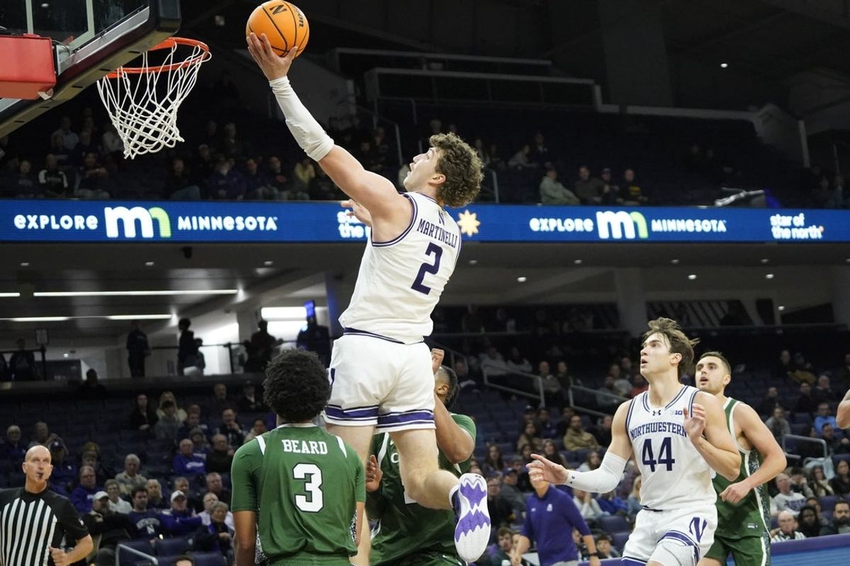 Nov 10, 2025; Evanston, Illinois, USA; Northwestern Wildcats forward Nick Martinelli (2) drives to the basket against the Cleveland State Vikings during the second half at Welsh-Ryan Arena. Mandatory Credit: David Banks-Imagn Images