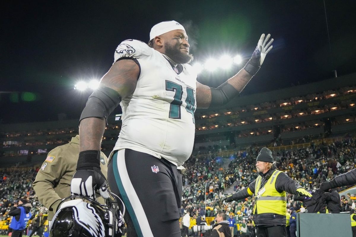 Nov 10, 2025; Green Bay, Wisconsin, USA;  Philadelphia Eagles offensive tackle Fred Johnson (74) waves to the crowd following the game against the Green Bay Packers at Lambeau Field. Mandatory Credit: Jeff Hanisch-Imagn Images
