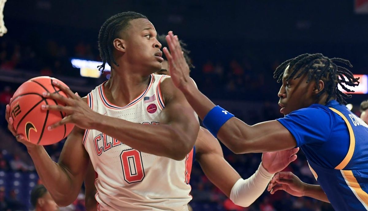 Clemson Tigers forward RJ Godfrey (0) is defended by Morehead State Eagles guard Davion Cunningham (2) Tuesday, Nov. 11, 2025, during the NCAA men’s basketball game at Littlejohn Coliseum in Clemson, South Carolina.