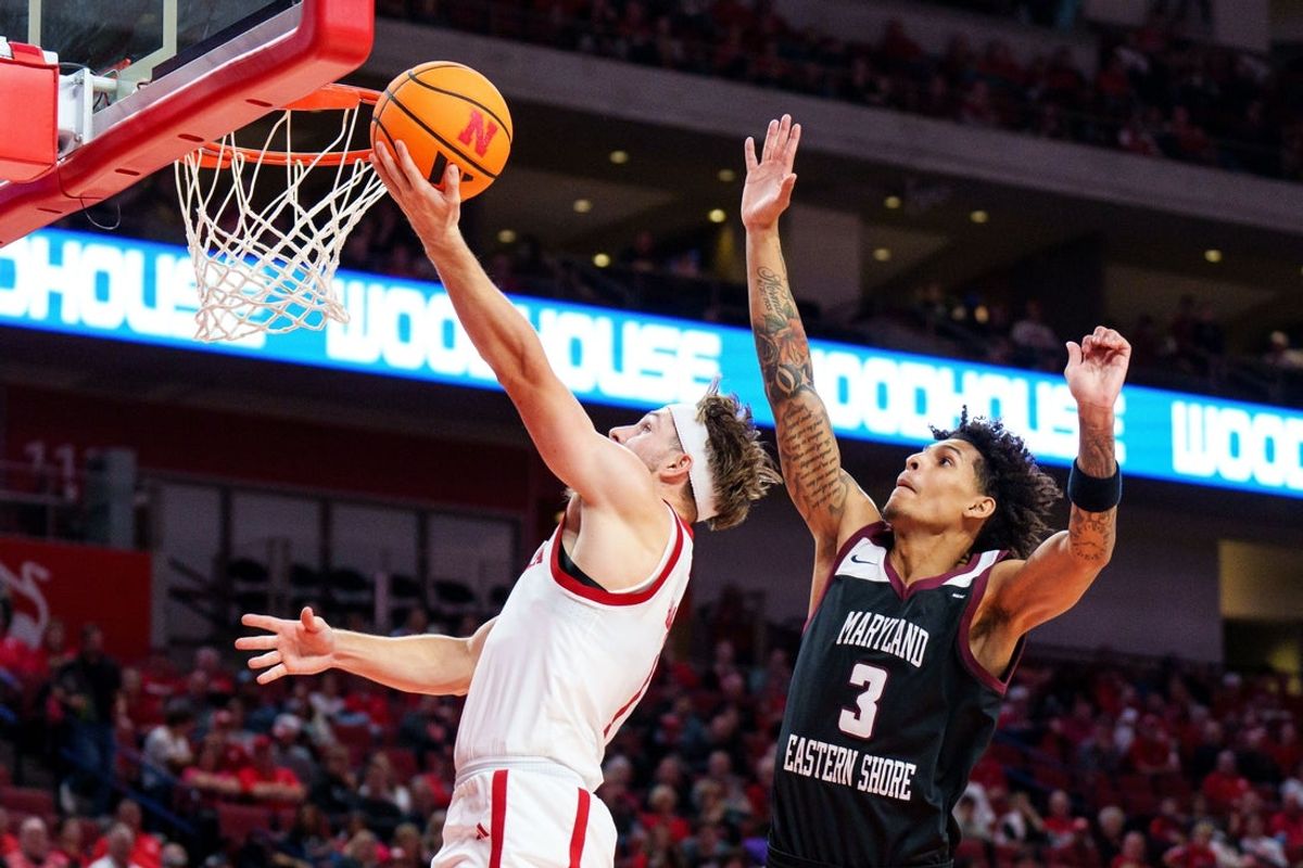 Nov 11, 2025; Lincoln, Nebraska, USA; Nebraska Cornhuskers guard Sam Hoiberg (1) shoots the ball against Maryland Eastern Shore Hawks guard Trey Brown (3) during the first half at Pinnacle Bank Arena. Mandatory Credit: Dylan Widger-Imagn Images