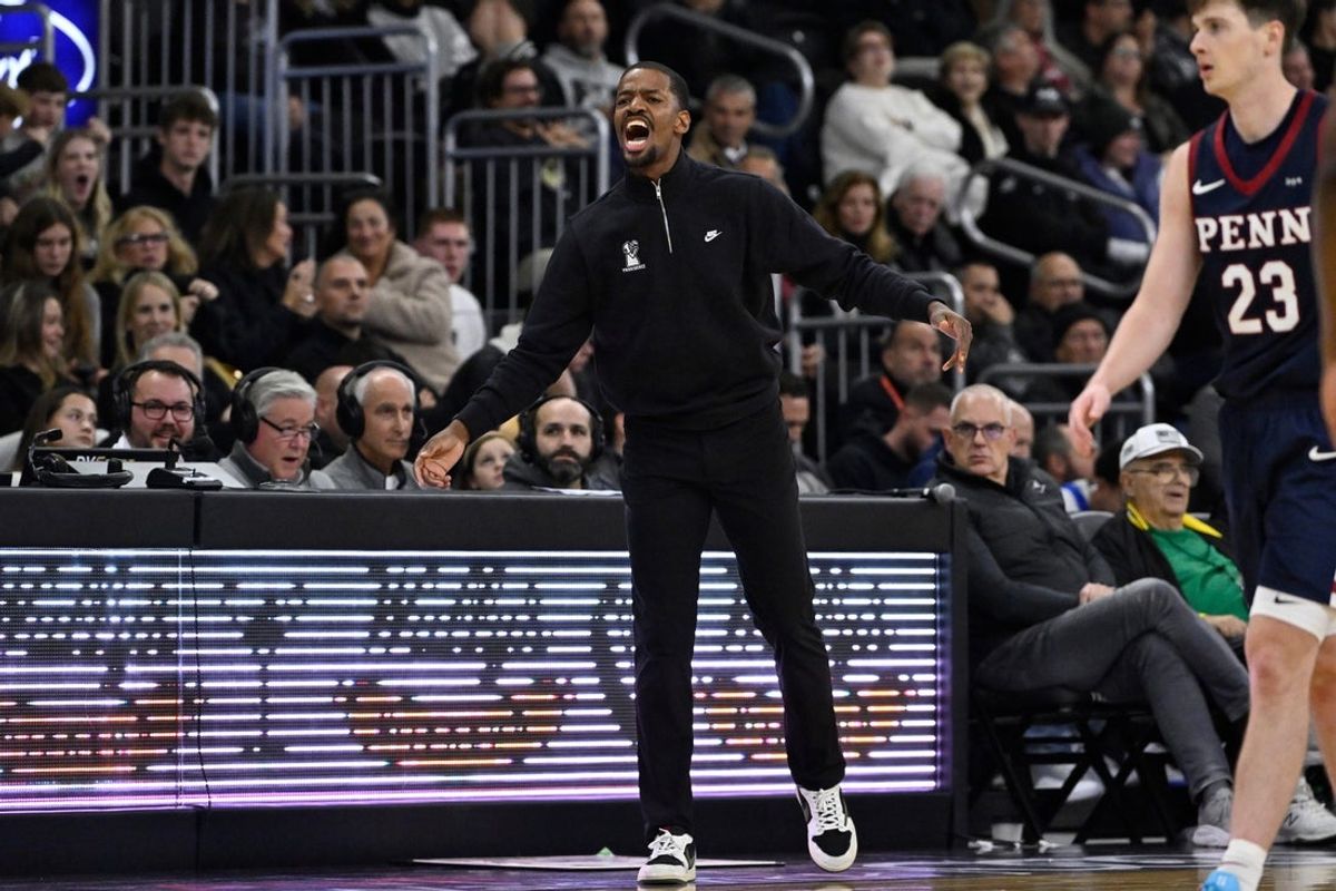 Nov 11, 2025; Providence, Rhode Island, USA; Providence Friars head coach Kim English directs players during the second half against the Penn Quakers at Amica Mutual Pavilion. Mandatory Credit: Eric Canha-Imagn Images