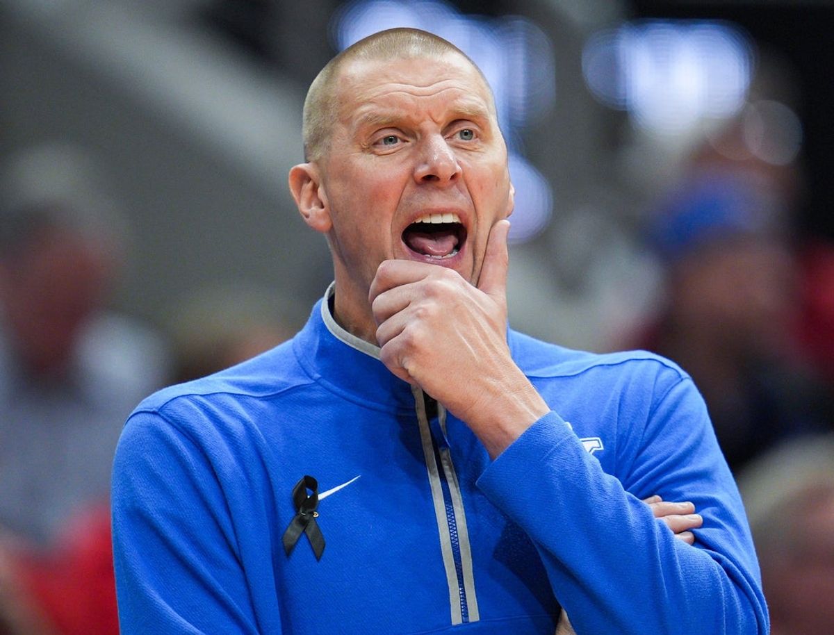 Kentucky Wildcats head coach Mark Pope watches as the Cards go up on Kentucky in the first half during the UofL-UK annual rivalry game at the KFC Yum! Center in Louisville, Kentucky Nov. 11, 2025.