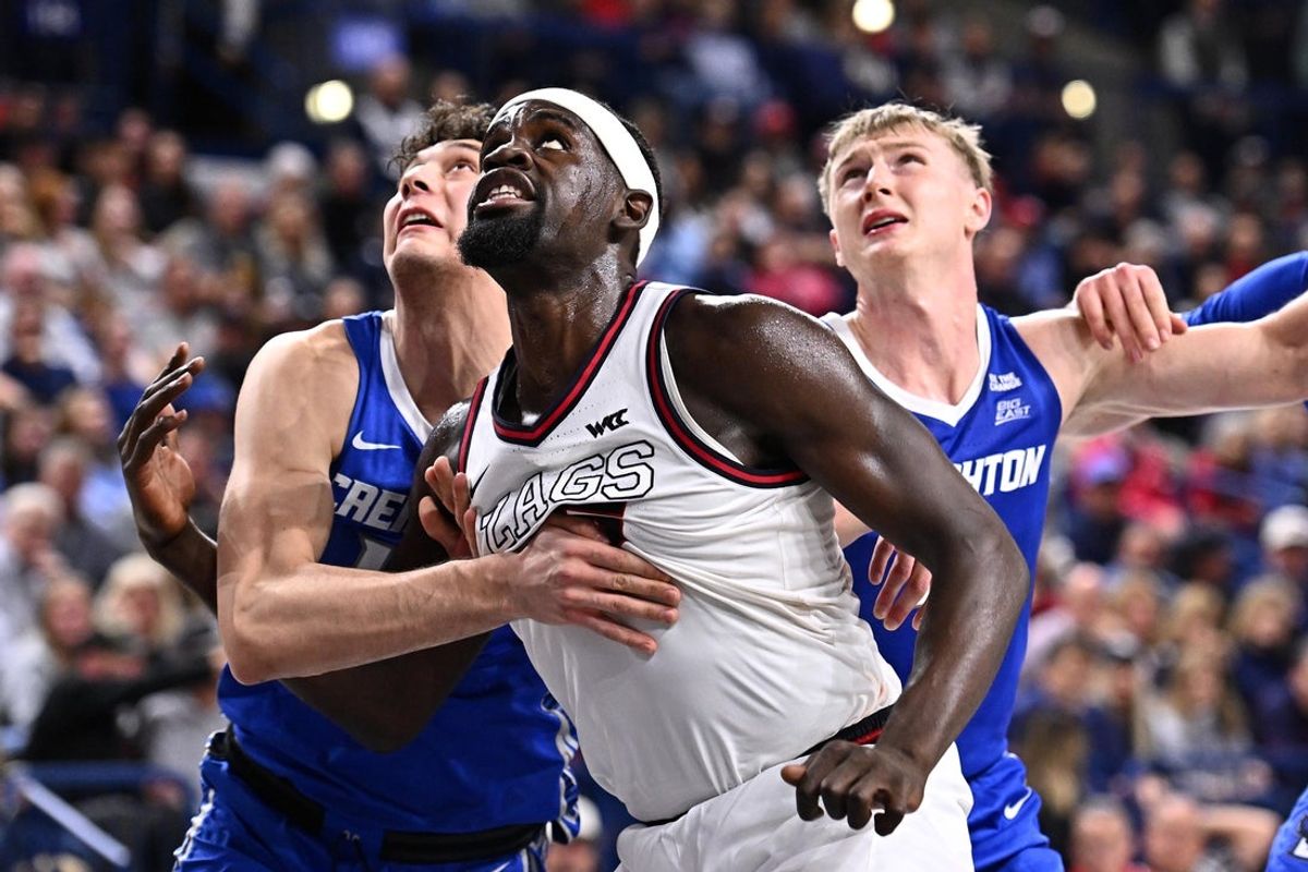 Nov 11, 2025; Spokane, Washington, USA;Gonzaga Bulldogs forward Graham Ike (15) fights for position against Creighton Bluejays forward Kerem Konan (17) and Creighton Bluejays guard Josh Dix (4) in the second half at McCarthey Athletic Center. Gonzaga Bulldogs won 90-63. Mandatory Credit: James Snook-Imagn Images